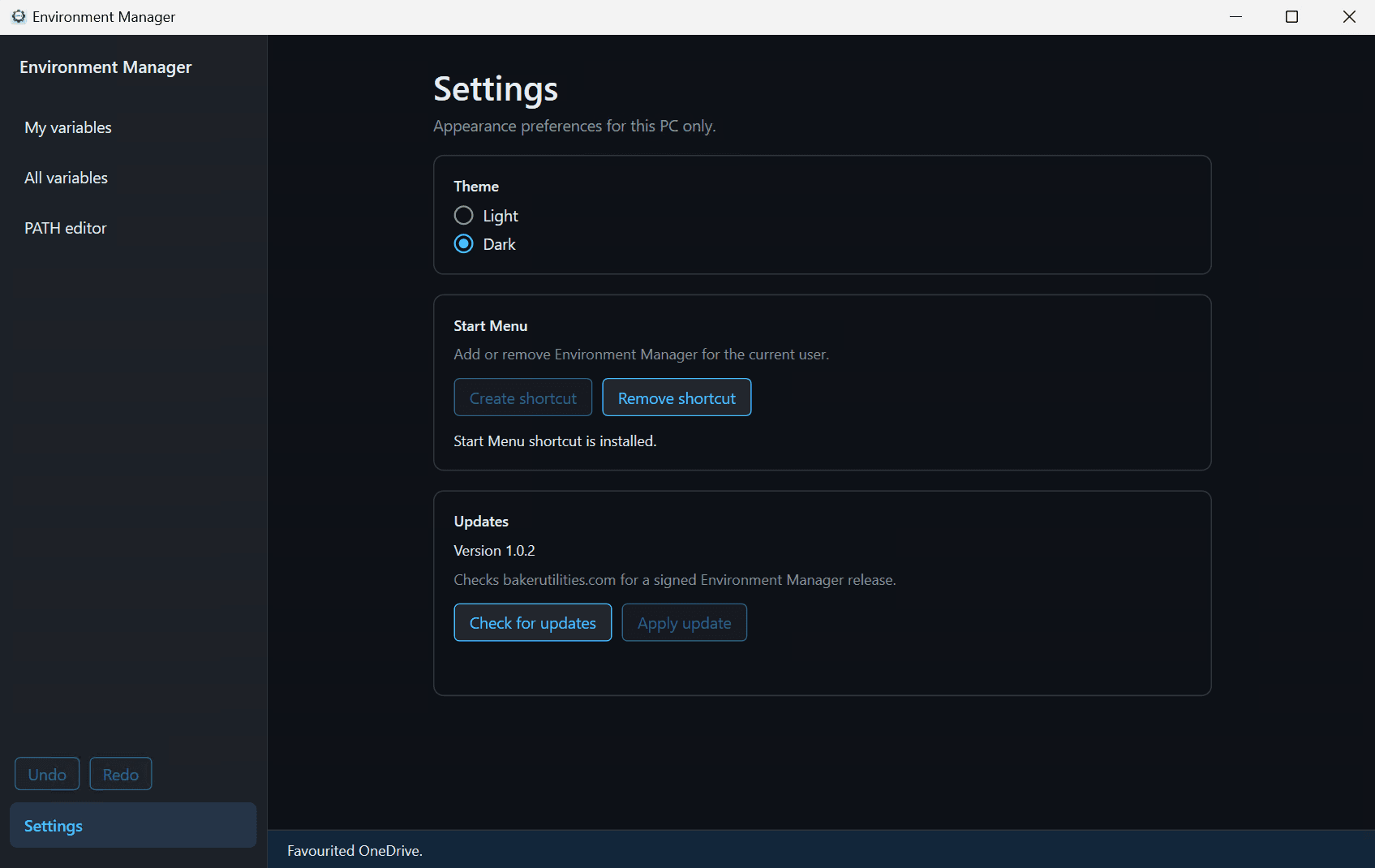 Environment Manager Settings page in dark theme, with Dark selected and the Updates section showing version 1.0.2.